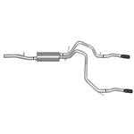 Gibson 65669 stainless steel cat-back exhaust system with dual split rear-exit pipes and polished slash-cut tips.