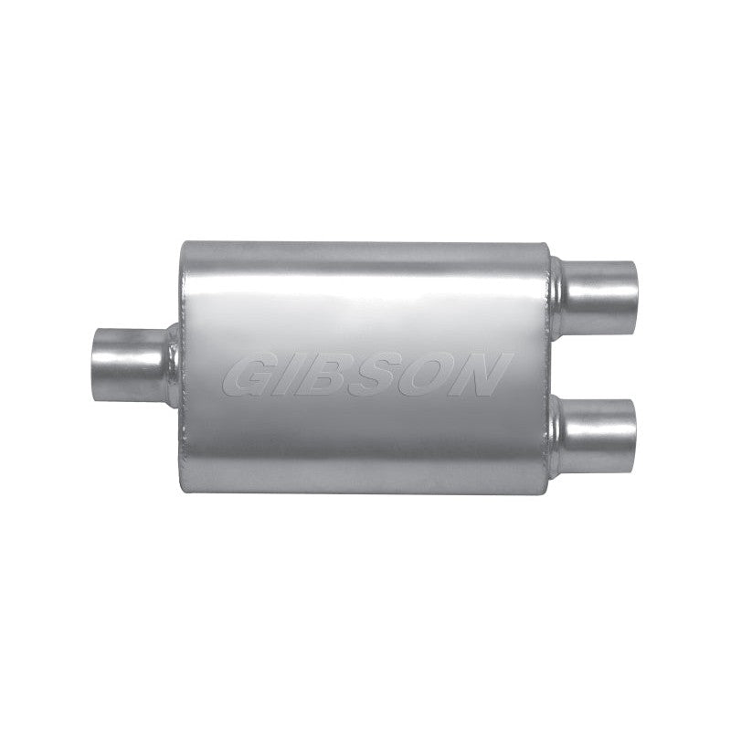 Gibson MWA Superflow stainless steel oval muffler with 3-inch center inlet and 2.5-inch dual outlets.