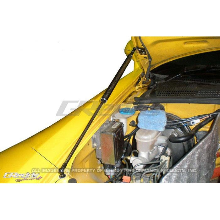GReddy engine hood lifter kit with gas dampers and mounting hardware for 2000-2009 Honda S2000.