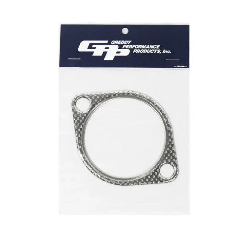GReddy 3.0-inch exhaust flange gasket with round bolt holes and a high-temperature composite construction.