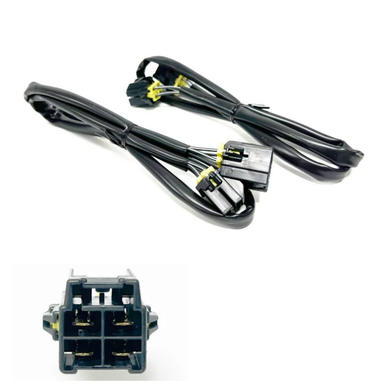 GReddy electric fan extension harness pair featuring multi-pin connectors and black protective wire looming.