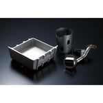 GReddy silver cast aluminum oil pan for RB26DETT featuring external cooling fins and internal baffles.