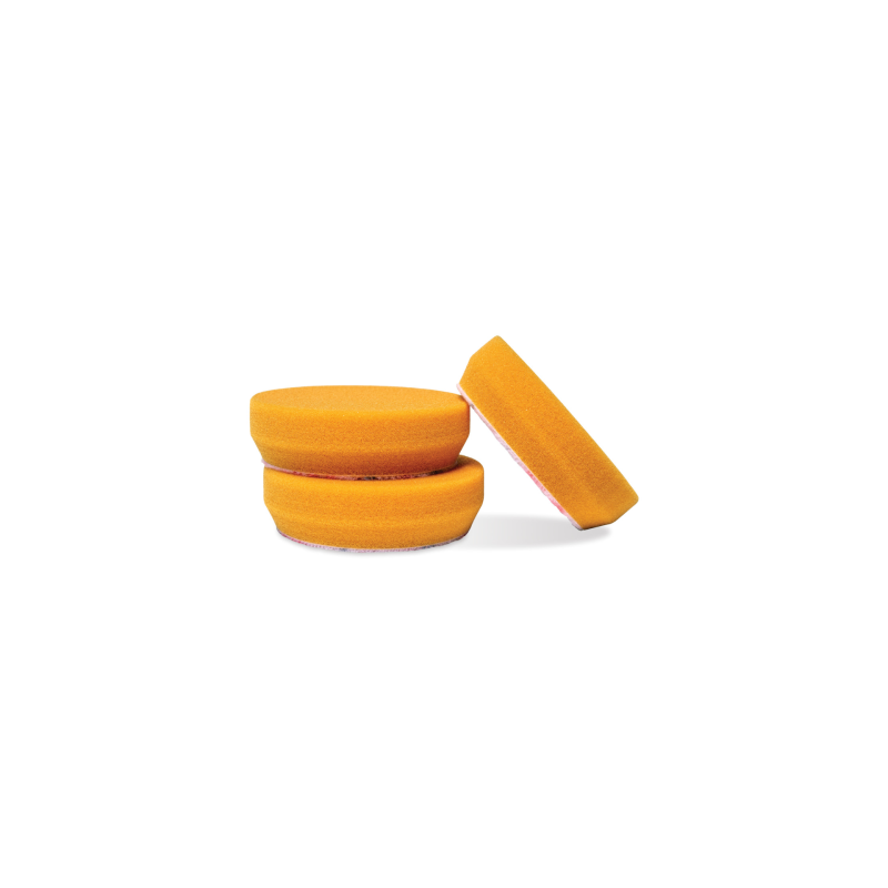 Three Griot's Garage 3-inch orange foam polishing pads showing the textured face and hook-and-loop backing.