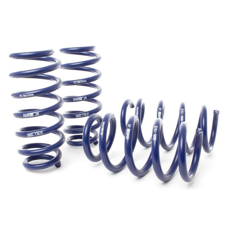 Four blue H&R Sport Springs for 2020-2022 Tesla Model Y AWD Performance non-air suspension models.