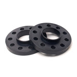 Black anodized H&R Trak+ 7mm DR Series wheel spacers featuring a 5/130 bolt pattern and 71.6mm hubcentric bore.