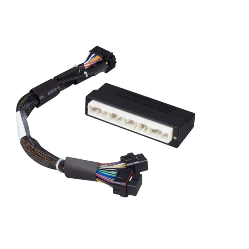 Haltech Elite 1000 and 1500 series ECU plug-and-play adaptor harness with multi-pin connectors and black loomed wiring.