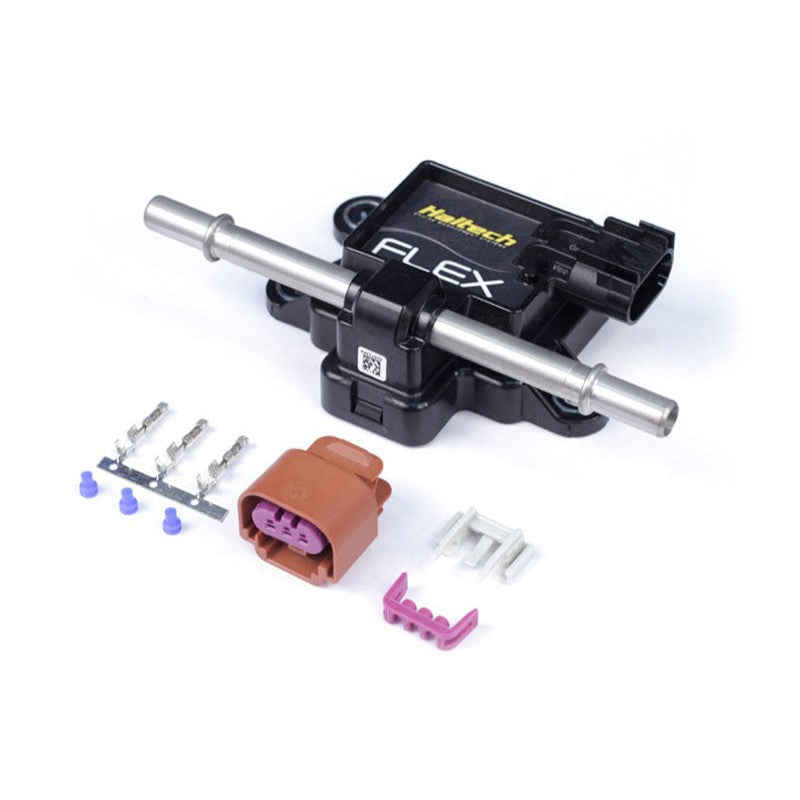Haltech flex fuel composition sensor with black housing and 3/8 inch GM spring lock style fuel fittings.