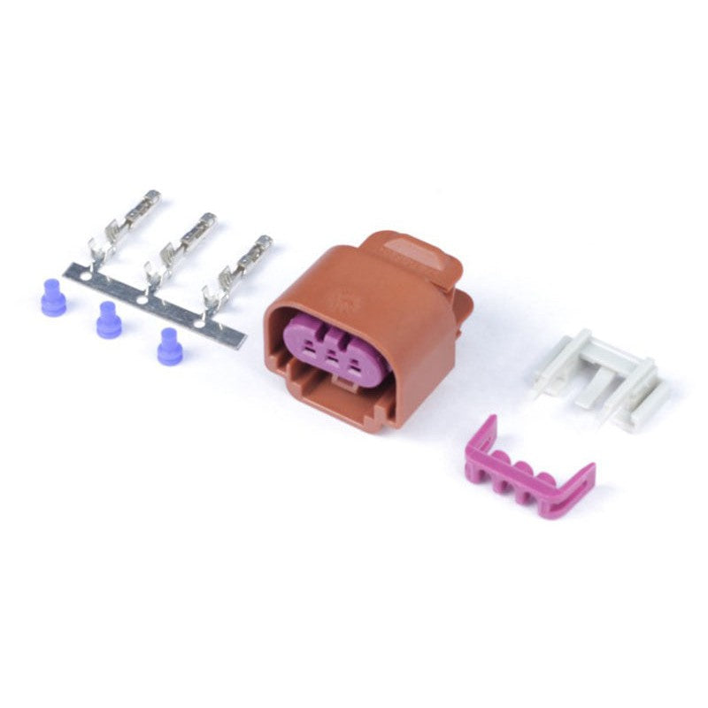 Haltech HT-011001 3-pin flex fuel composition sensor connector plug and three silver wiring terminals.
