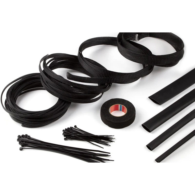 Haltech HT-039300 harness dressing kit including nylon sleeving, heat shrink, cable ties, and fleece tape