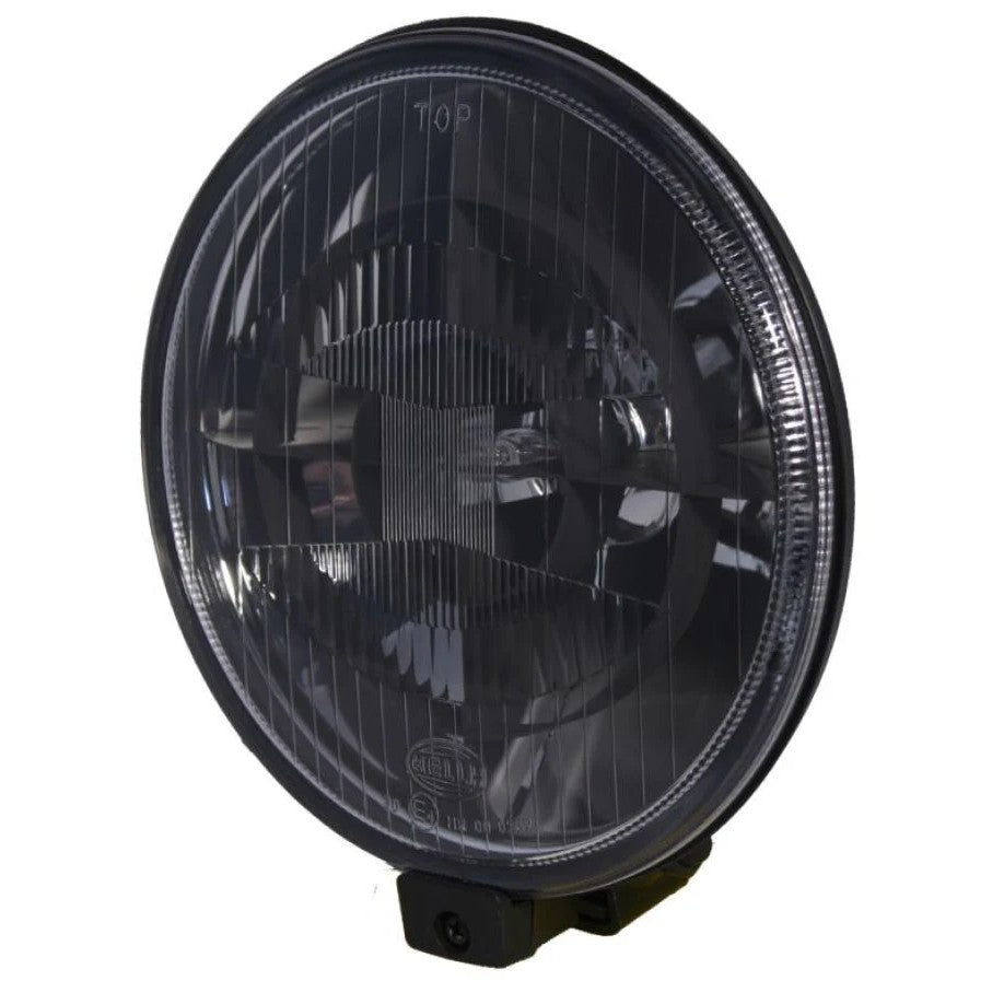 HELLA 500 Series Black Magic auxiliary driving lamps with black-out reflectors and mounting hardware.