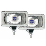 Rectangular Hella 550 Series halogen driving lamps with protective stone shields, wiring harness, and mounting hardware.