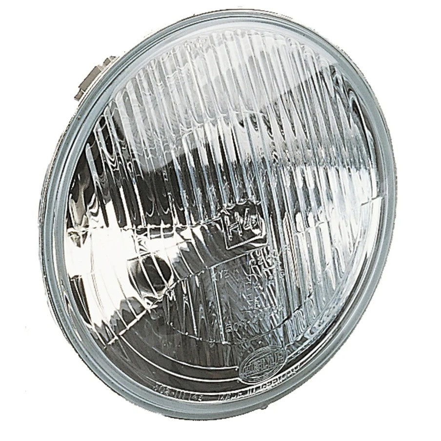 Round Hella Vision Plus 165mm 7-inch H4 ECE conversion headlamp with glass lens and internal reflector.