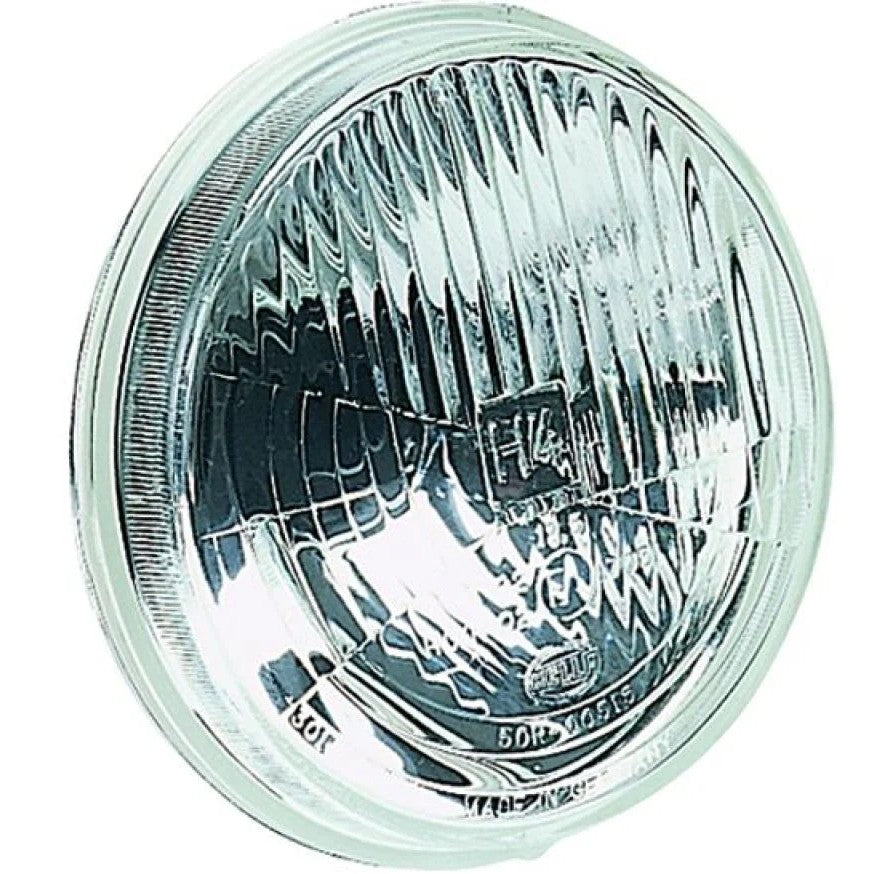 Hella Vision Plus 5-3/4 inch round H4 halogen conversion headlamp with glass lens and metal reflector.