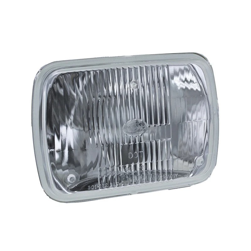 Hella Vision Plus 8in x 6in rectangular sealed beam conversion headlamp with clear glass lens and multi-surface reflector.