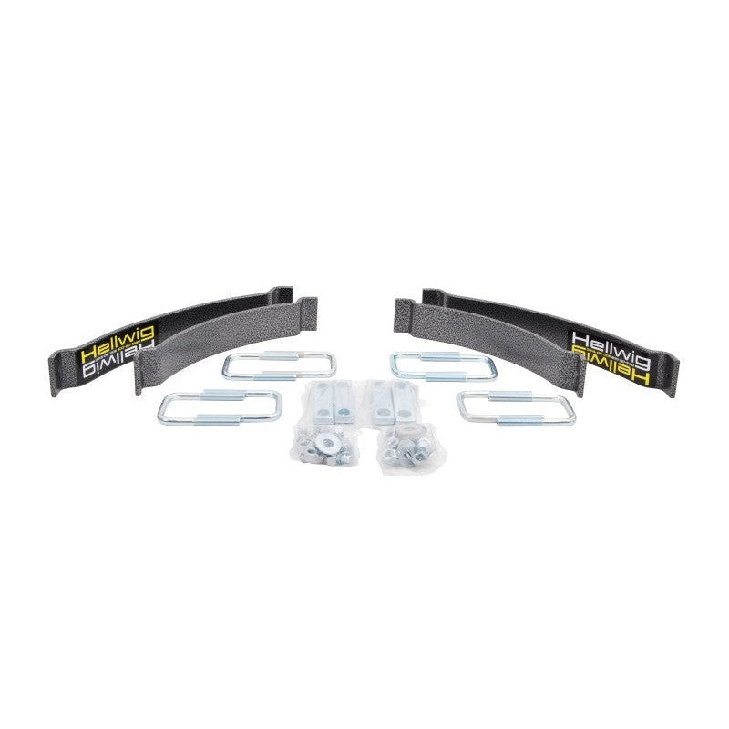Hellwig EZ-1000 black powder-coated steel helper spring with zinc-plated U-bolts and mounting hardware.
