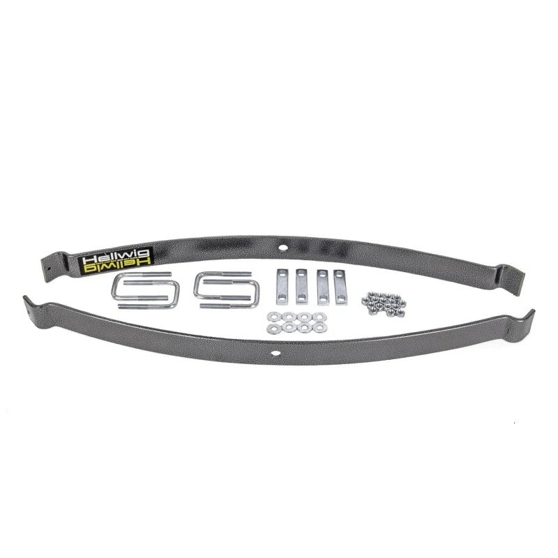 Hellwig EZ-990 helper spring kit featuring black powder-coated steel leaves and heavy-duty U-bolt mounting hardware.