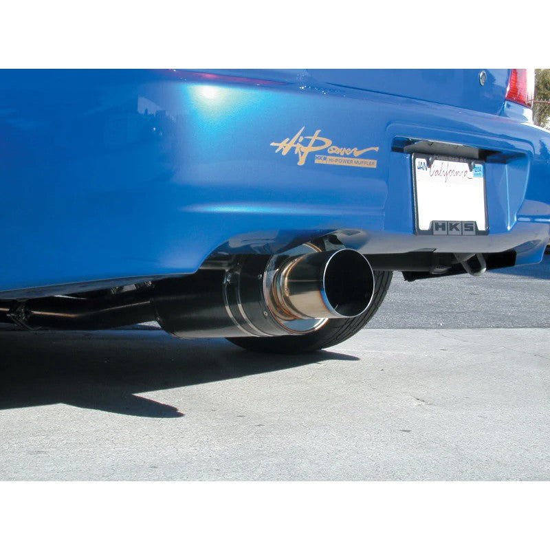 HKS Carbon Ti cat-back exhaust system featuring carbon fiber muffler shell and burnt titanium tip for Subaru WRX STi.