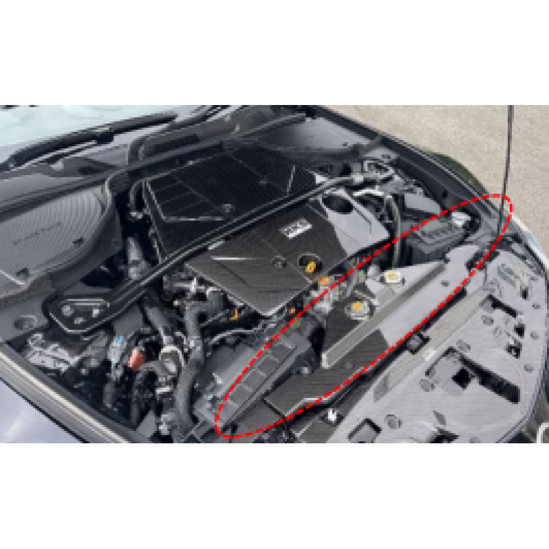 HKS dry carbon fiber radiator cooling plate for 2023 Nissan Z featuring a high-gloss weave and precise fitment.
