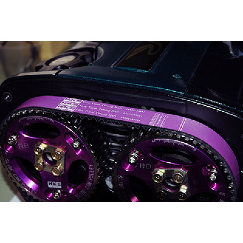 Purple HKS Fine Tune Timing Belt Sport for RB26 engines with white HKS logo branding and part number 24999-AN002.
