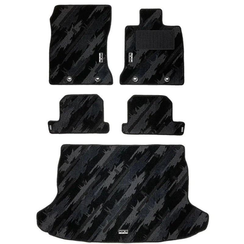 Full set of HKS Oil Color floor mats for LHD Toyota GR86 and Subaru BRZ with signature HKS splash pattern.