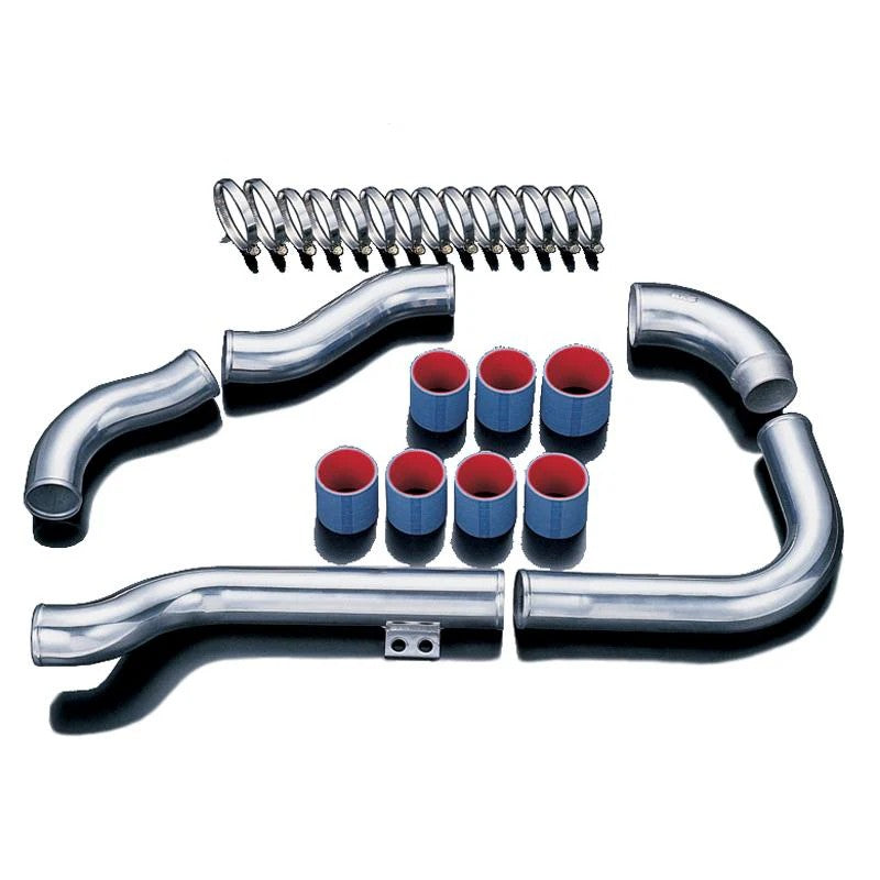 HKS buffed aluminum intercooler piping kit with blue silicone couplers for Nissan Skyline GT-R R33 and R34.