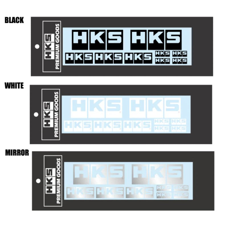 Sheet of assorted white HKS logo decals in various sizes for automotive styling