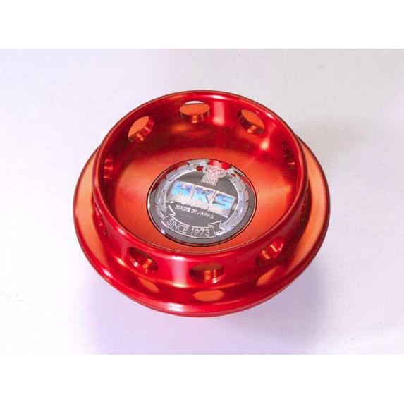 Red anodized HKS billet aluminum oil filler cap for Nissan and Honda engines with engraved HKS logo.