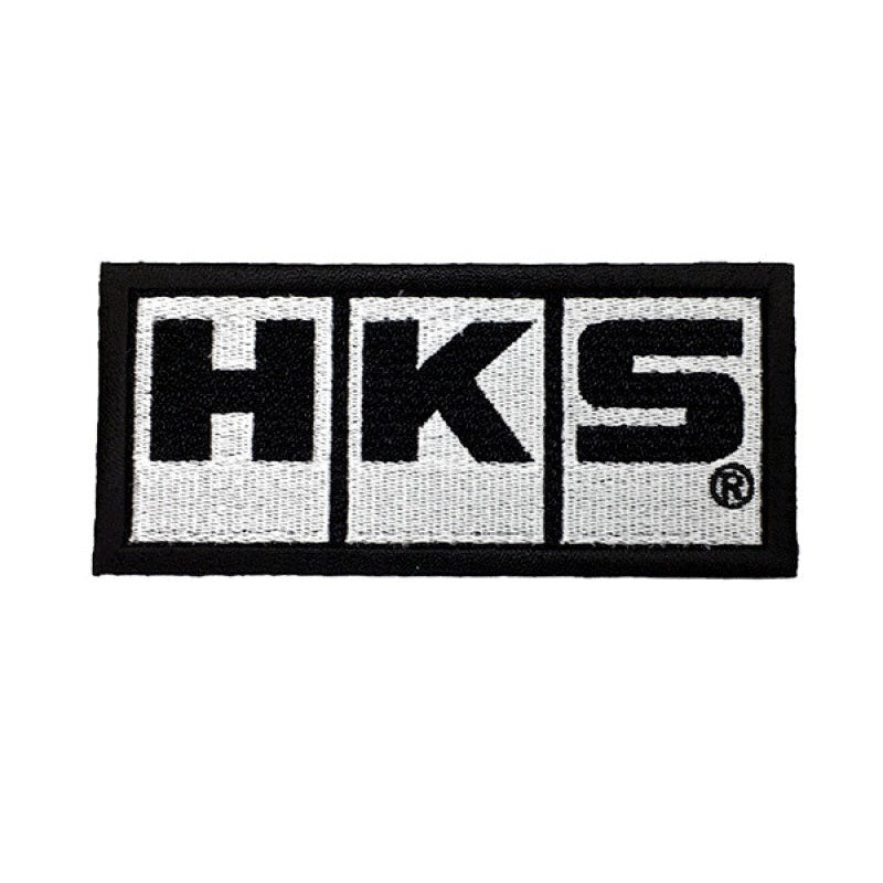 HKS W105 white embroidered rectangular patch with black HKS logo branding