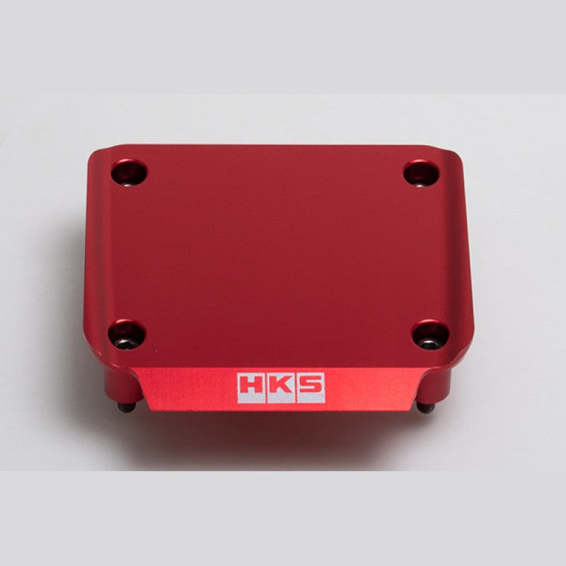Red HKS ignition power transistor cover for Nissan RB26DETT engines with HKS branding