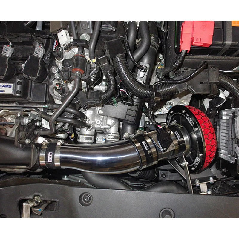 HKS Racing Suction intake system for Honda Civic FK7 featuring a red Super Power Flow filter and polished piping