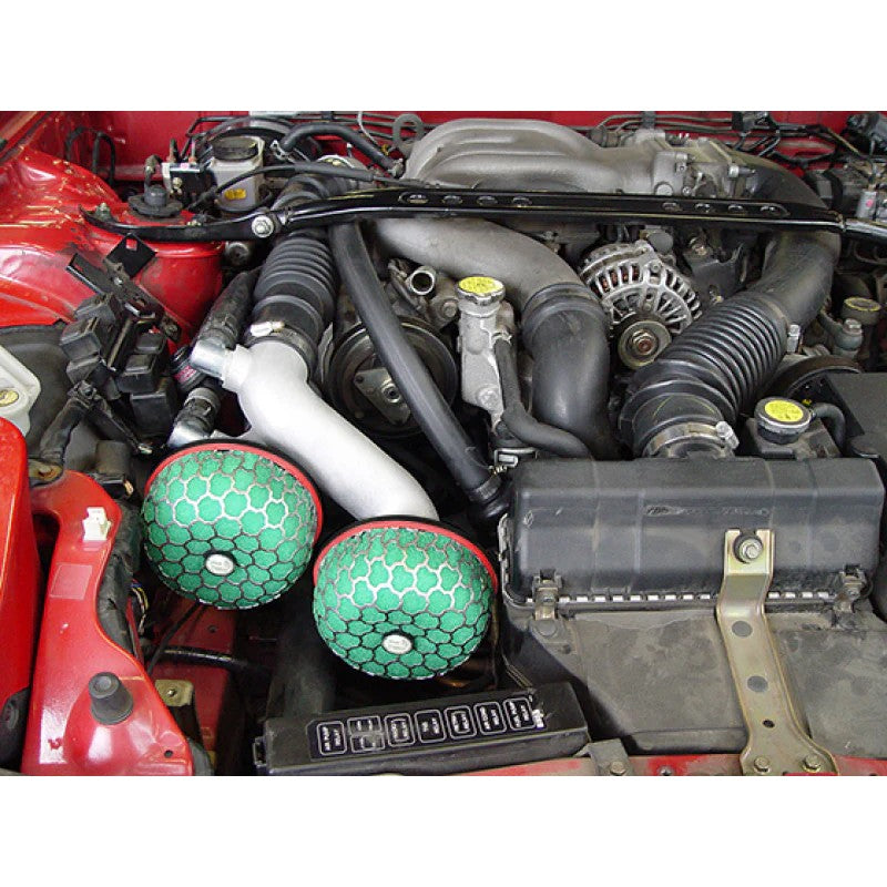 HKS Super Power Flow air intake system featuring a green foam filter and honeycomb frame for Mazda RX-7 FD3S.