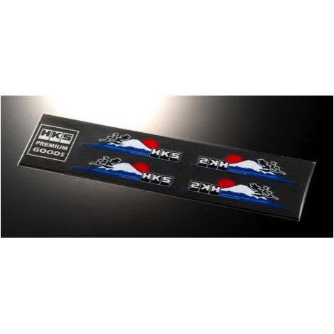 Four HKS logo vinyl stickers in a set featuring the classic HKS brand color scheme and typography.