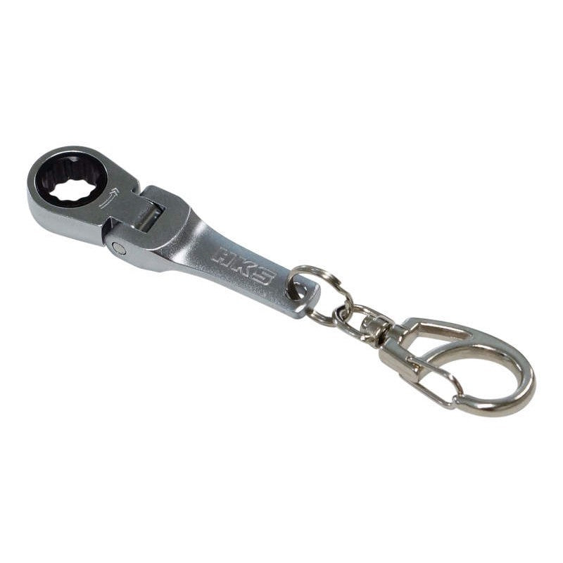 HKS and Tone branded silver metal miniature ratchet key chain with functional ratcheting mechanism.