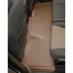 Black Husky Liners Classic Style 2nd row floor mat featuring raised UniEdge ridges and StayPut Cleats.