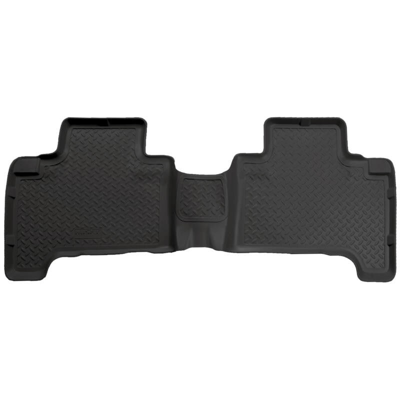 Black Husky Liners Classic Style one-piece second row floor liner for 2003-2009 Toyota 4Runner.