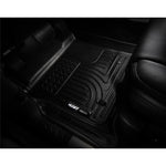 Black Husky Liners WeatherBeater front floor liners with 3D scanned contours and raised edges for Dodge Ram trucks.