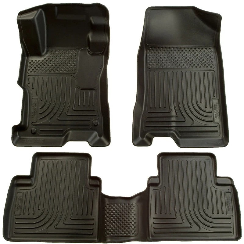 Black Husky Liners WeatherBeater front and rear floor mats for 2004-2009 Toyota Prius.