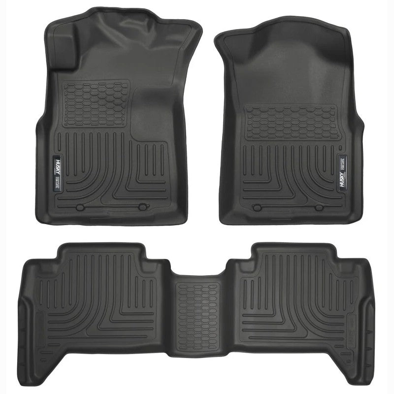Black Husky Liners WeatherBeater front and rear floor mats for 2005-2015 Toyota Tacoma.