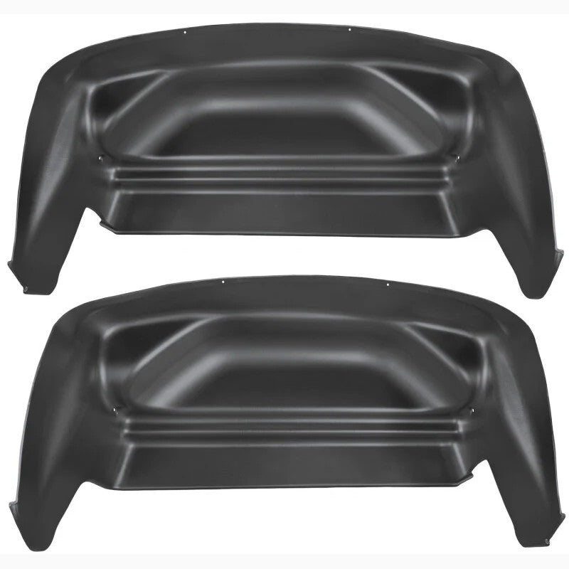 Husky Liners black impact-resistant thermoplastic rear wheel well guard for Chevrolet Silverado and GMC Sierra trucks.