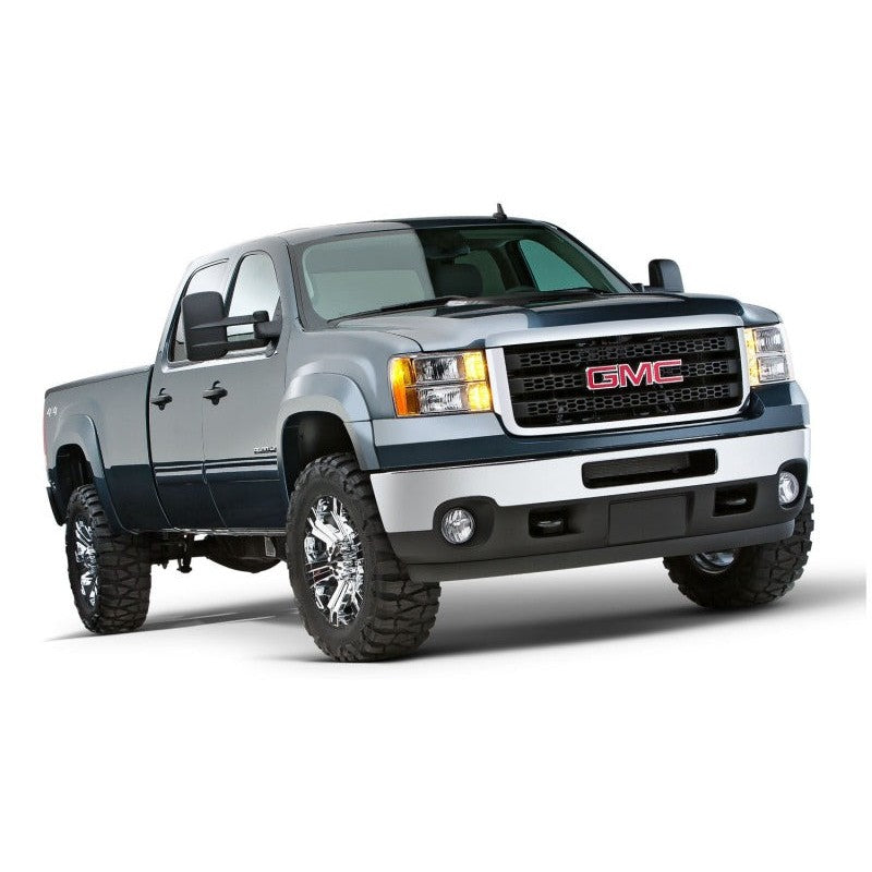 Four-piece set of matte black Husky Liners Extend-A-Fender flares for 2007-2014 GMC Sierra 1500 and 2500 HD.