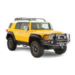 Four-piece set of Husky Liners Pocket Style black fender flares with stainless steel rivets for Toyota FJ Cruiser.