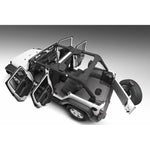 Husky Liners Guardian Impact full-coverage black cushioned flooring system installed in a Jeep Wrangler Unlimited JKU