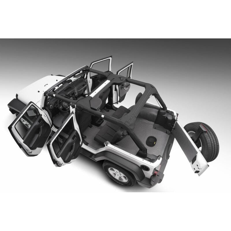 Husky Liners Guardian Impact full-coverage black cushioned flooring system installed in a Jeep Wrangler Unlimited JKU