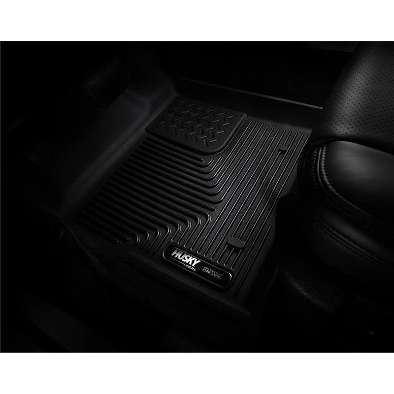 Black Husky Liners X-act Contour second row floor liner with StayPut Nibs and raised FormFit Edge