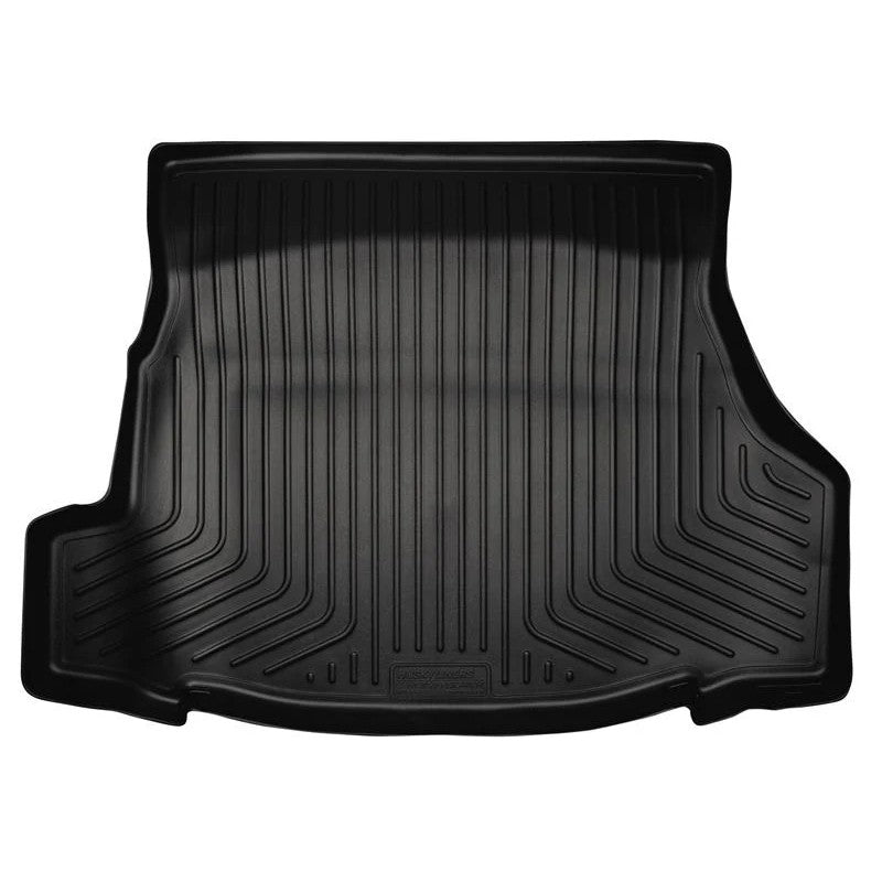 Black Husky Liners WeatherBeater trunk liner for 2010-2014 Ford Mustang coupe with raised spill-containing edges.