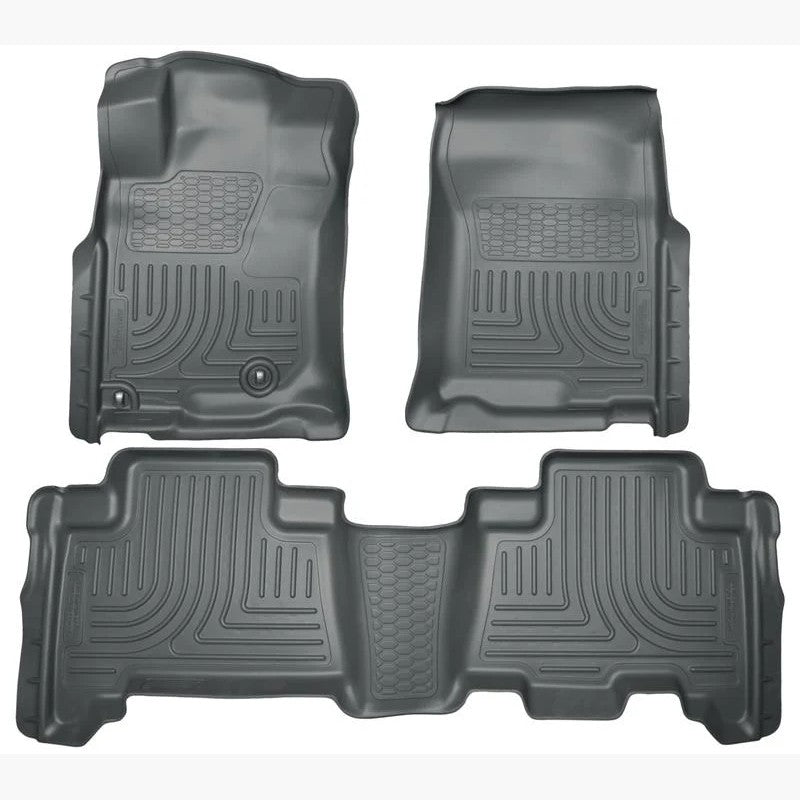 Husky Liners WeatherBeater black front and second-row floor liners for 2010-2013 Lexus GX460 and Toyota 4Runner.