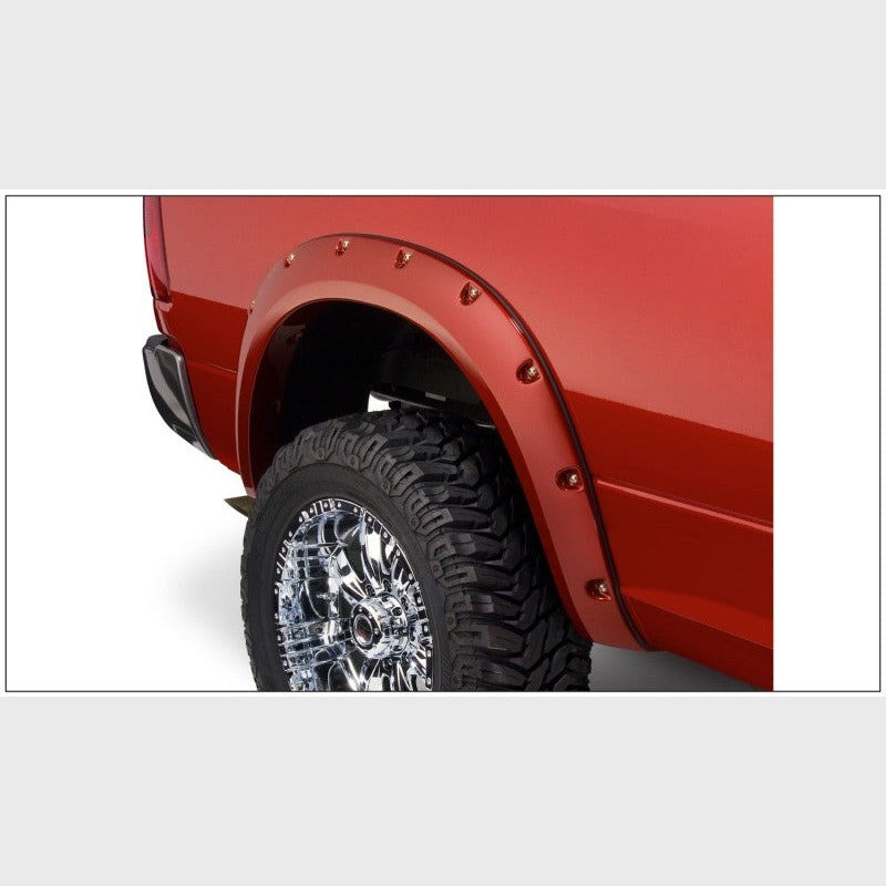 Set of four black Husky Liners Pocket Style Fender Flares with stainless steel rivets for 2010-2018 Ram 2500 and 3500.