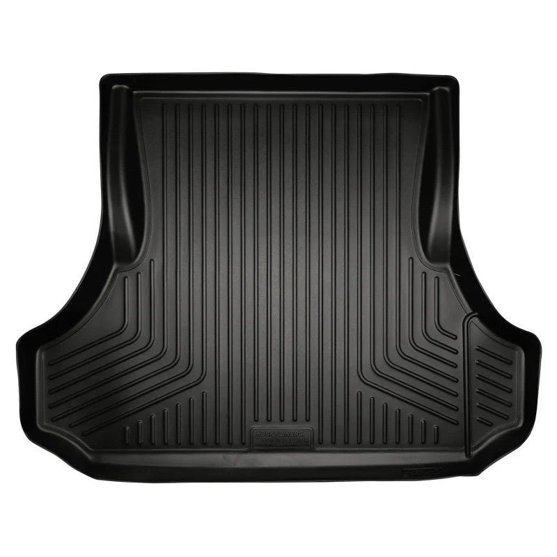 Black Husky Liners WeatherBeater trunk liner for Chrysler 300 and Dodge Charger showing raised containment edges.