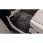 Black Husky Liners X-act Contour front floor liners showing the textured DuraGrip surface and raised spill-containment edges.