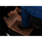 Black Husky Liners Heavy Duty 2nd row floor mats with raised containment ridges and StayPut Cleats.